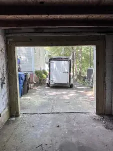 A van being parked in a garage