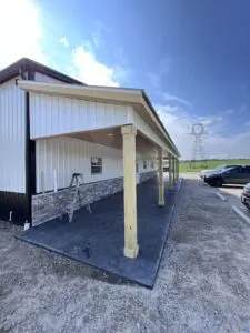 A building with a car parked in front of it